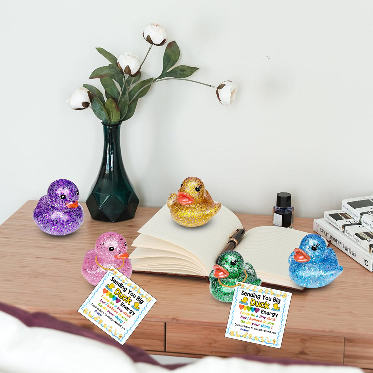 Sezua waterproof ducks with sealed glitter finish endure baths, pools, and outdoor play.