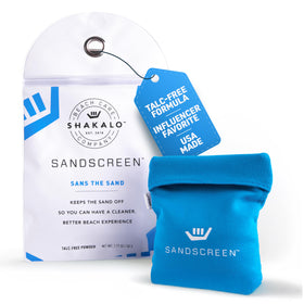 SHAKALO Sand Removal Bag on hands for quick sand cleanup before snacks