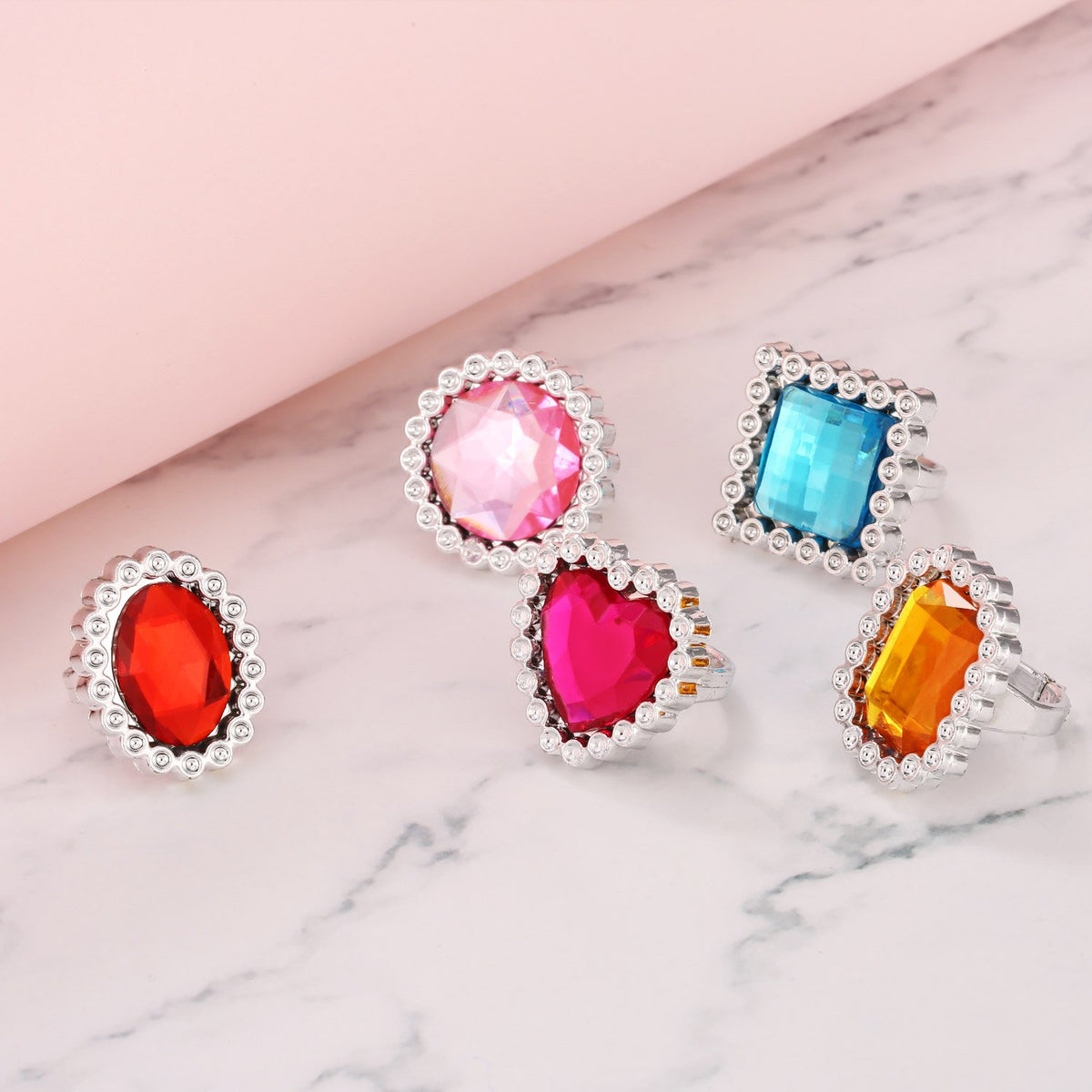Shappy square ring with bright gem for birthday dress-up adventures.