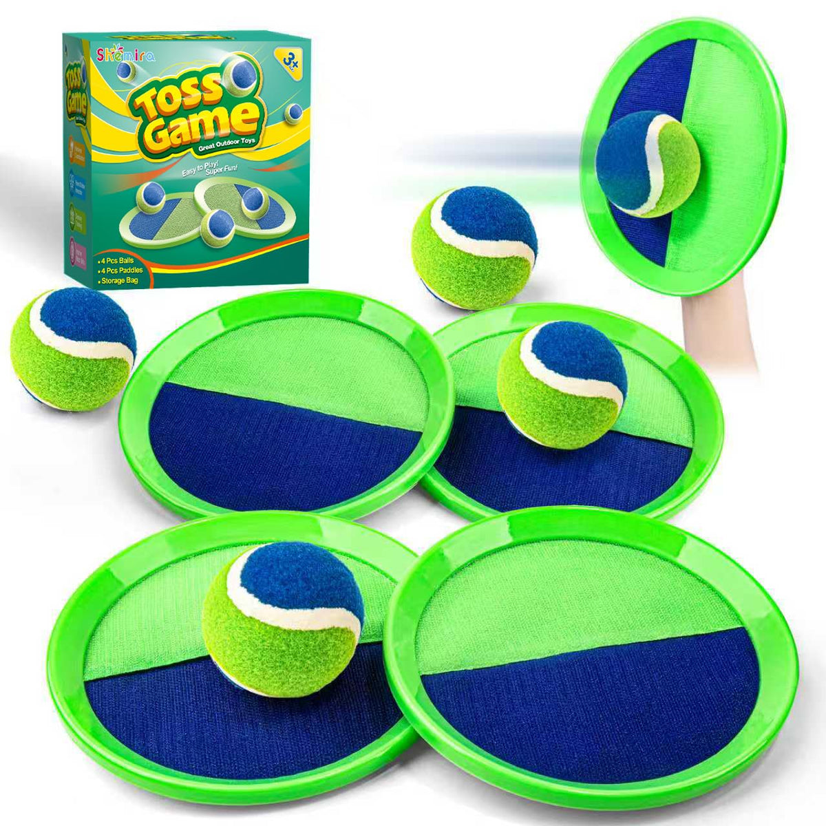 Shemira ball toss paddles in backyard for improved hand-eye coordination