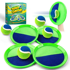 Shemira ball toss paddles in backyard for improved hand-eye coordination