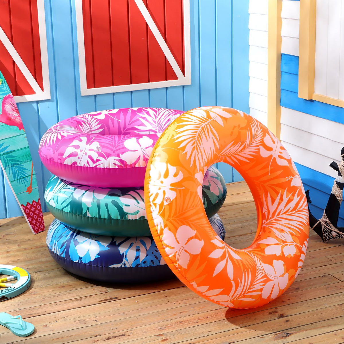 ShinyRelief pool tubes in purple leaf pattern add vibrant style for pool days.
