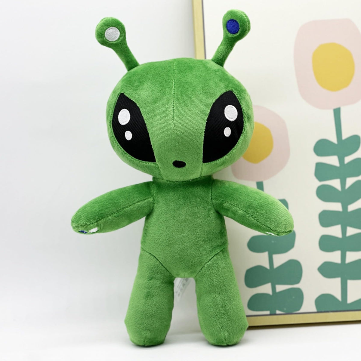 Shontay alien plush toy, side view, soft texture for comforting during naps