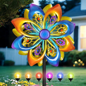 Shumi Solar Wind Spinners peacock-feather glow brightens outdoor decor at dusk