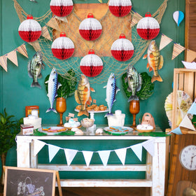 Silipull fishing-themed table decor creates cohesive party styling.