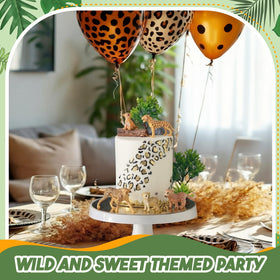 Simgoing cheetah cub topper adds cute safari charm to cupcakes.