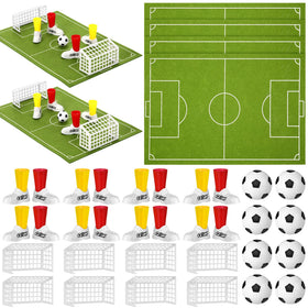 Simgoing field felt pads ready for tabletop soccer on a desk surface.
