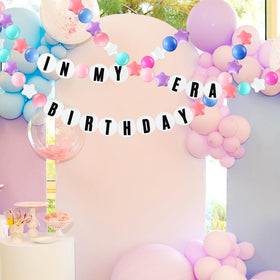 Simgoing foam circles and beads create lightweight banners for events.
