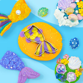 SIMPLIPLAY Mermaid Sensory Kit underwater scene with seashells invites exploration.