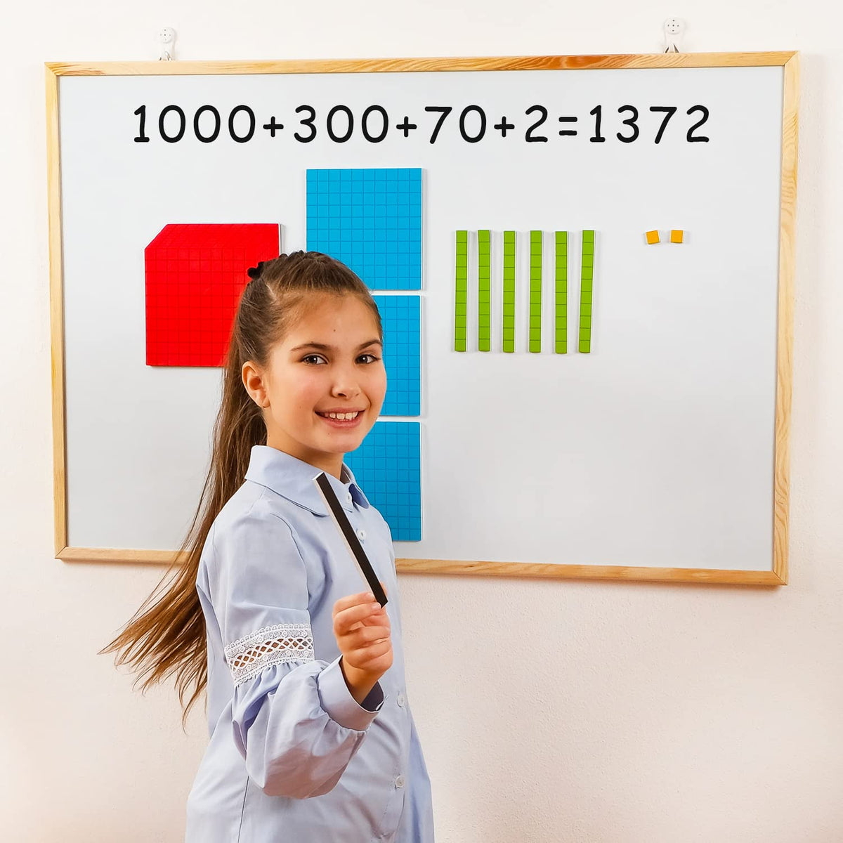 Simply Magic red cube base ten block aiding rapid place value understanding