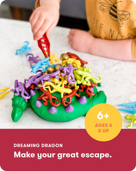 SimplyFun Dreaming Dragon lizards removal demonstrates careful hand-eye coordination