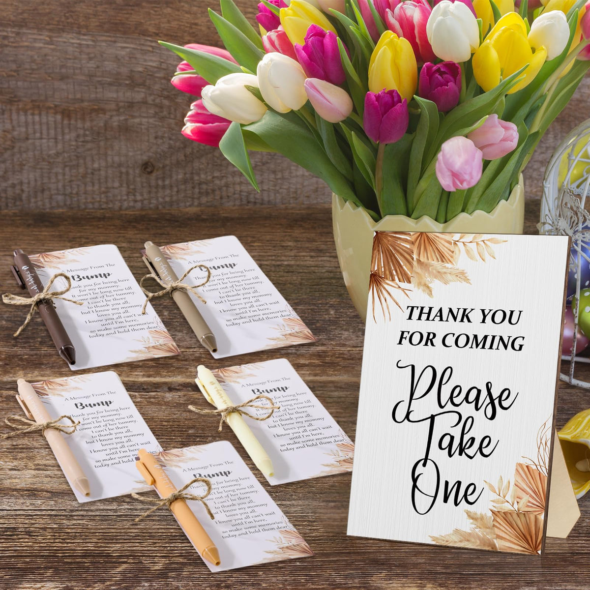 Sintuff table setup showing pens and cards for guests
