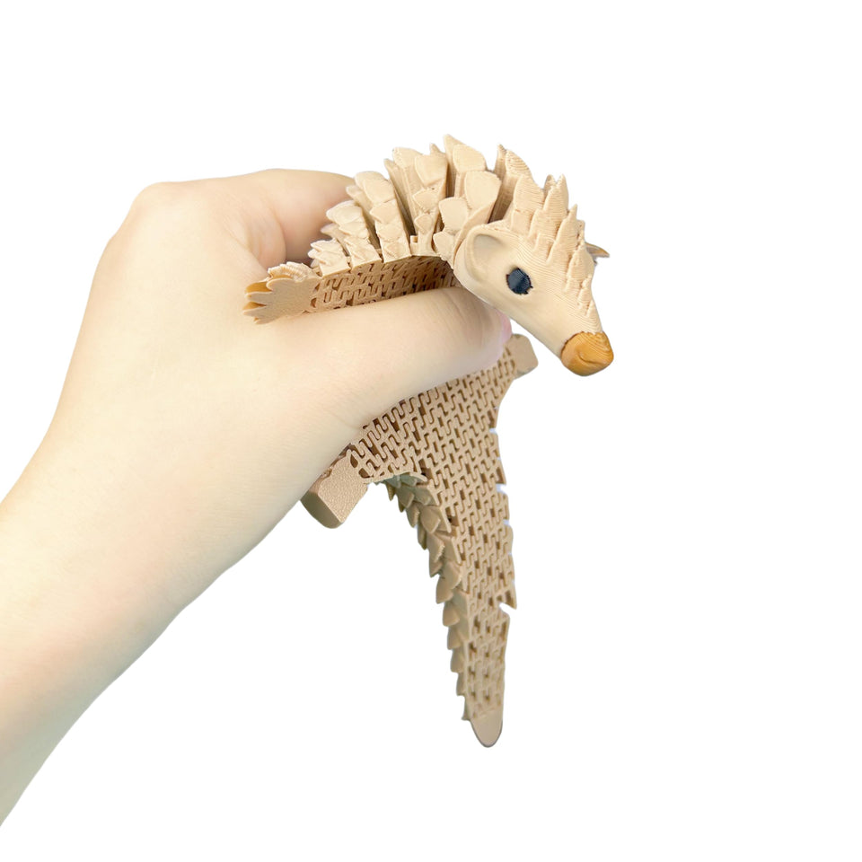 SIPWATE pangolin articulated figure with flexible joints for play and desk display.