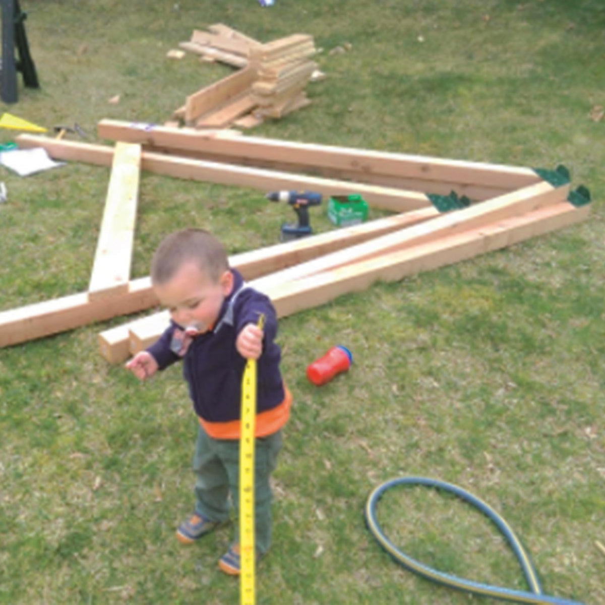 SIWOOD EZ Frame Bracket Green during installation with a swing set.