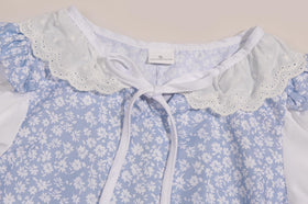 SIZGAROOT prairie dress fabric close-up highlights durable materials.