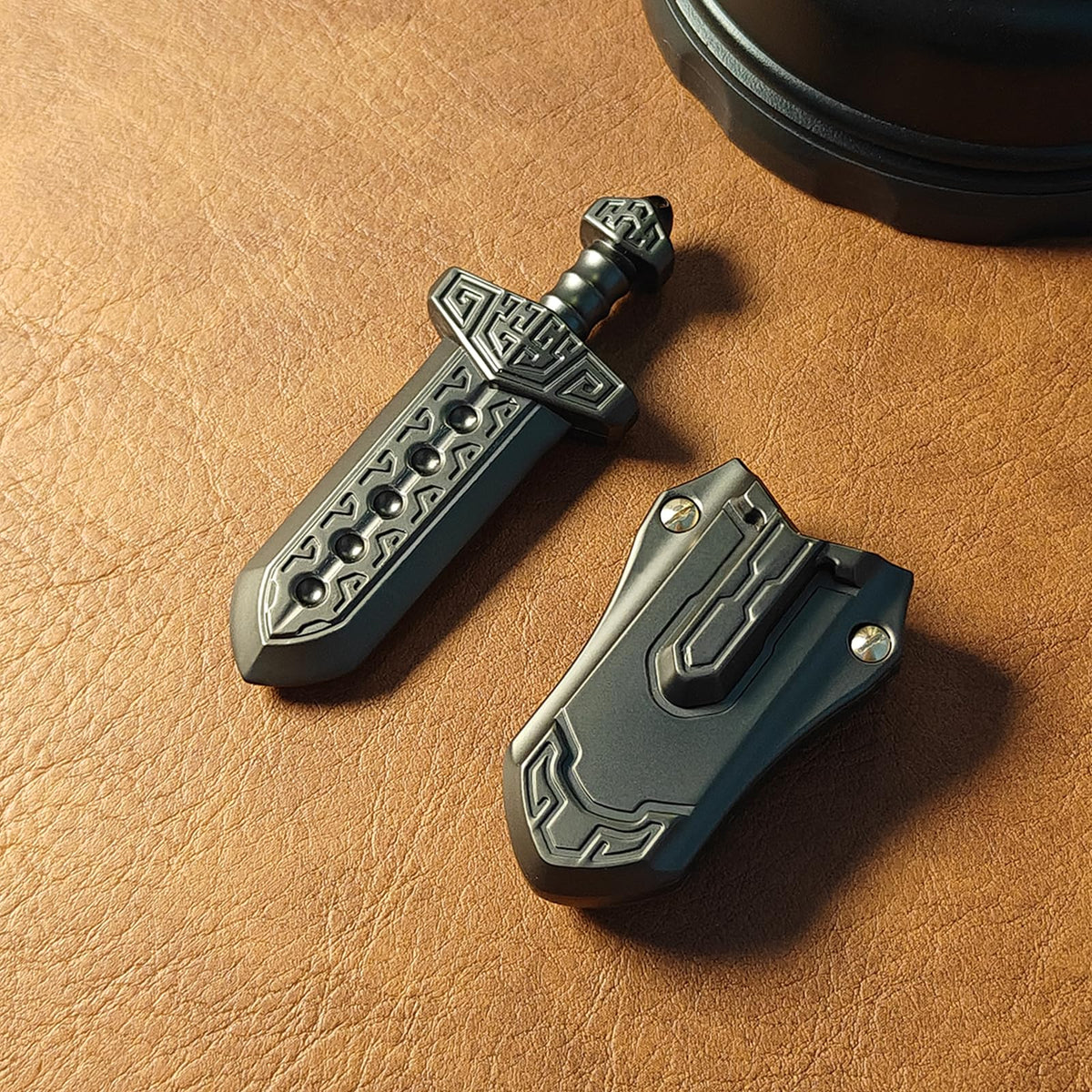 The SKEDC sword fidget slider mechanism detail reveals springs and grooves for tactile feedback.