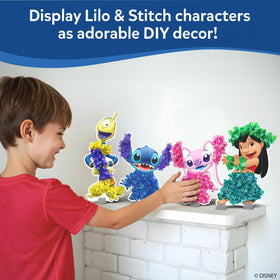 Stands arranged to hold completed Lilo & Stitch figures.