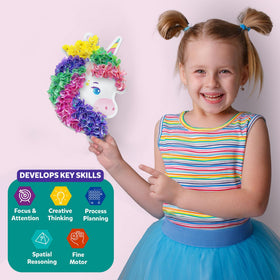 Skillmatics Poke-in Art unicorn dream decor hanging on a rainbow backdrop for bright room decor.