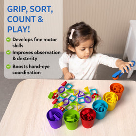 Skillmatics rainbow sort cups setup shows sorting practice and fine motor control.
