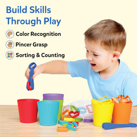 Skillmatics tongs grip practice with shapes promoting dexterity and hand-eye coordination.