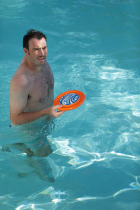 SkimBe Disc Toy in motion demonstrating smooth skim across water.