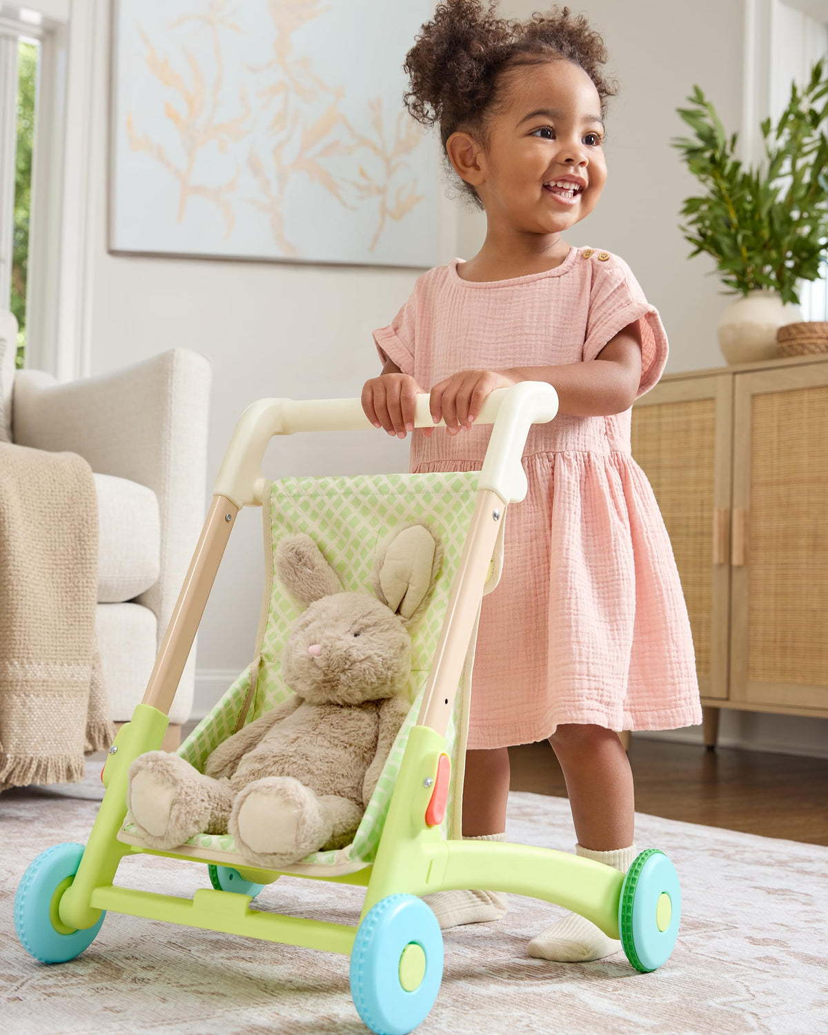 Skip Hop adjustable handle heights fit growing toddlers for comfortable cruising