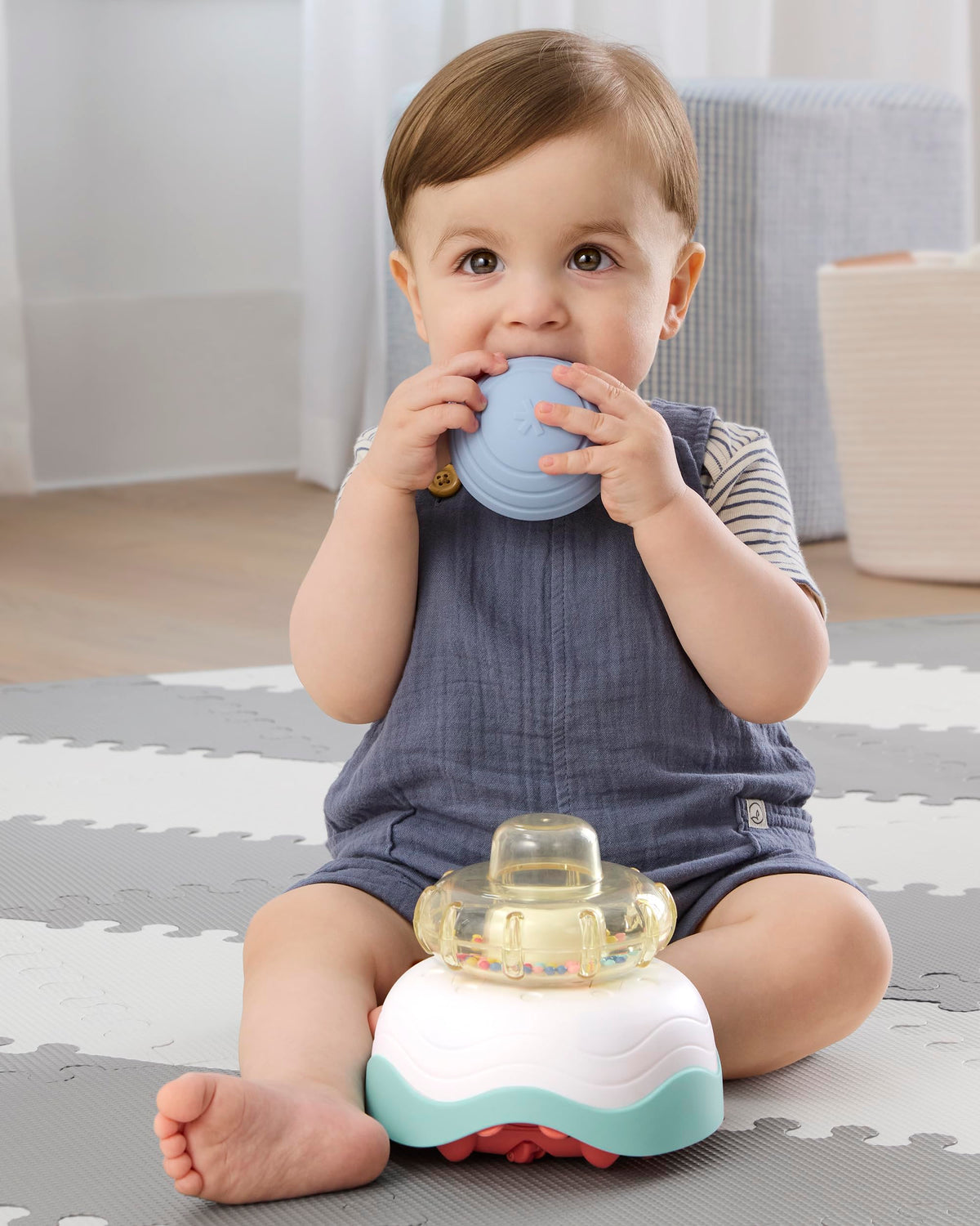 Skip Hop crab crawl toy obstacle detection helps safe exploration and confident movement.