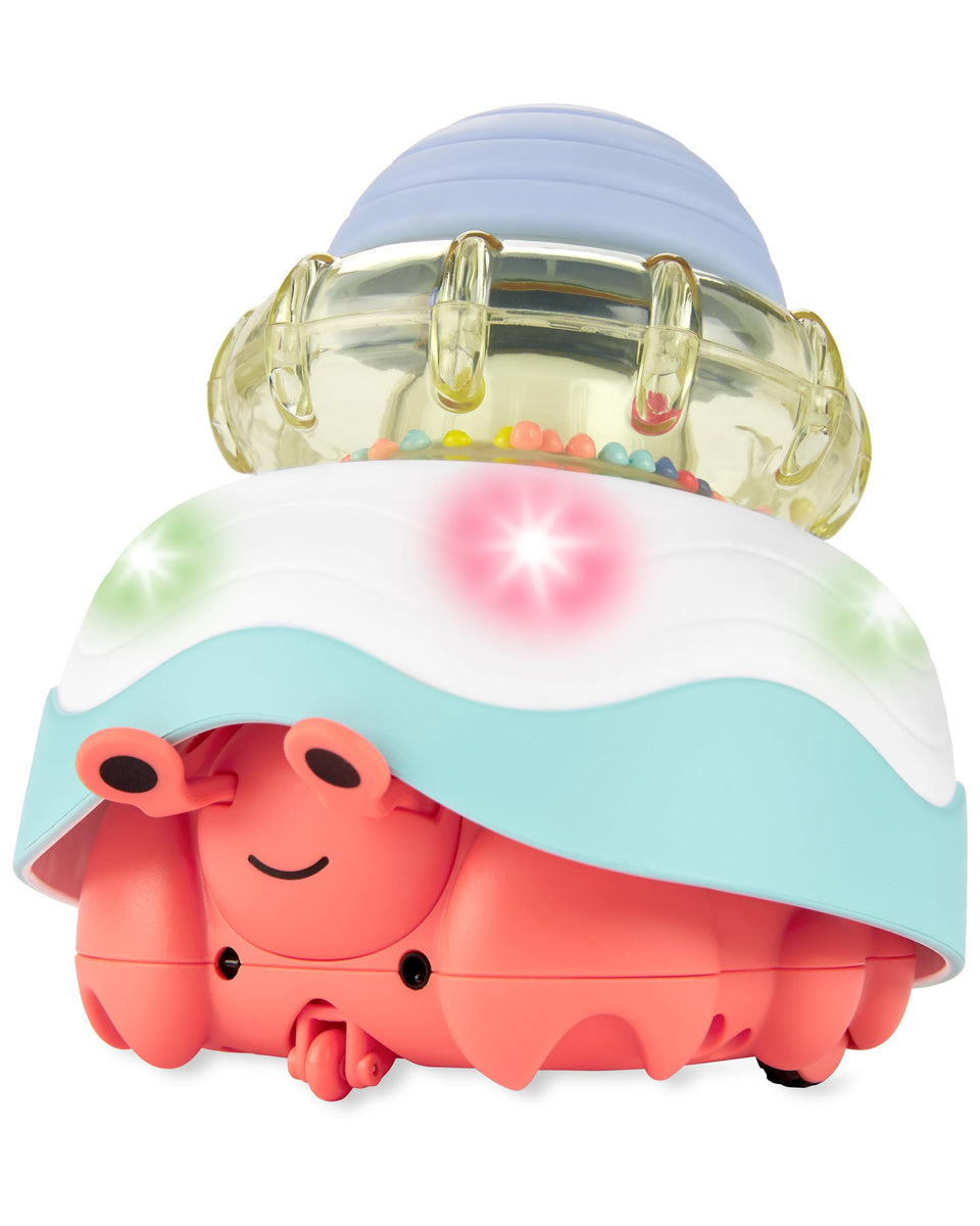 Skip Hop baby crab crawl toy shell peek encourages exploratory play and visual tracking.