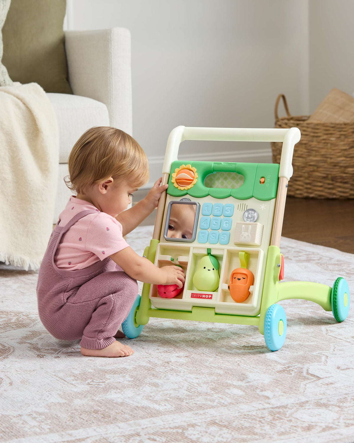 Skip Hop baby walker features 50-plus activities and lights for sensory exploration