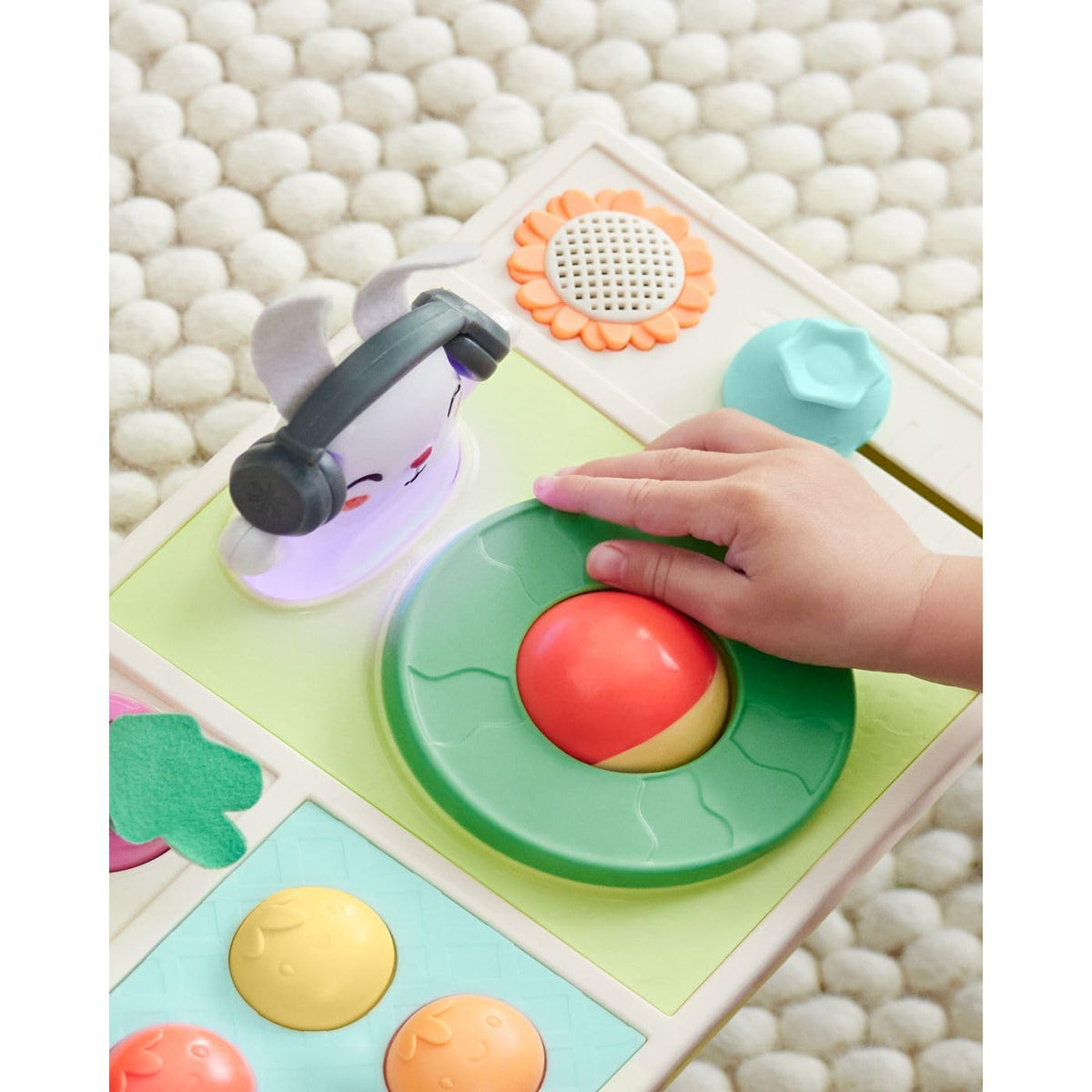 Skip Hop DJ Set blueberry slider provides tactile clack sounds for exploration