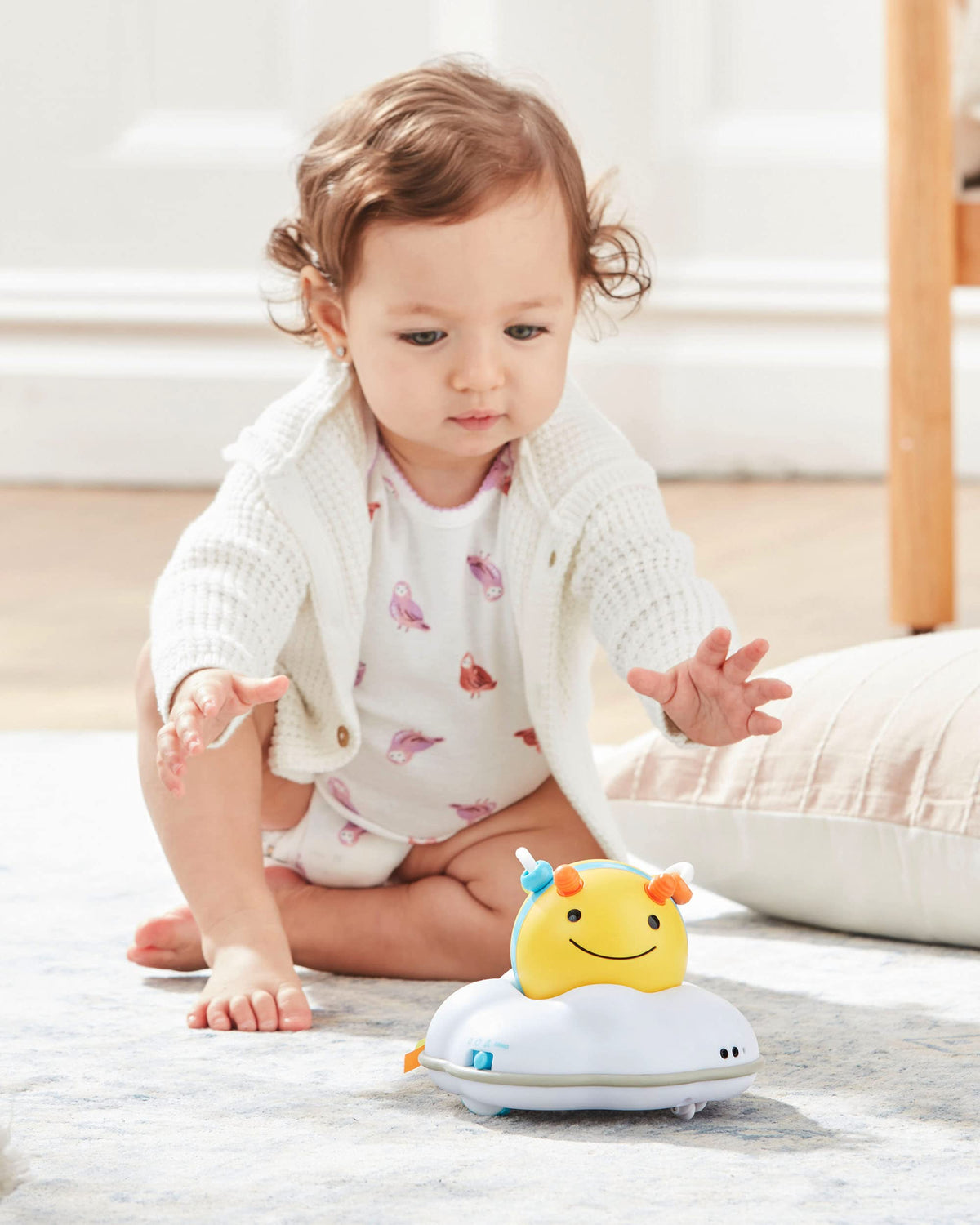 Skip Hop Follow-Me Bee teething beads offer safe chewing while baby explores textures.
