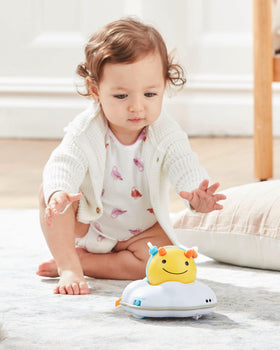 Skip Hop Follow-Me Bee teething beads offer safe chewing while baby explores textures.