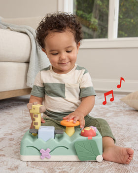 Skip Hop Geometric Wonders elephant bongo drum lights up for fun musical exploration.