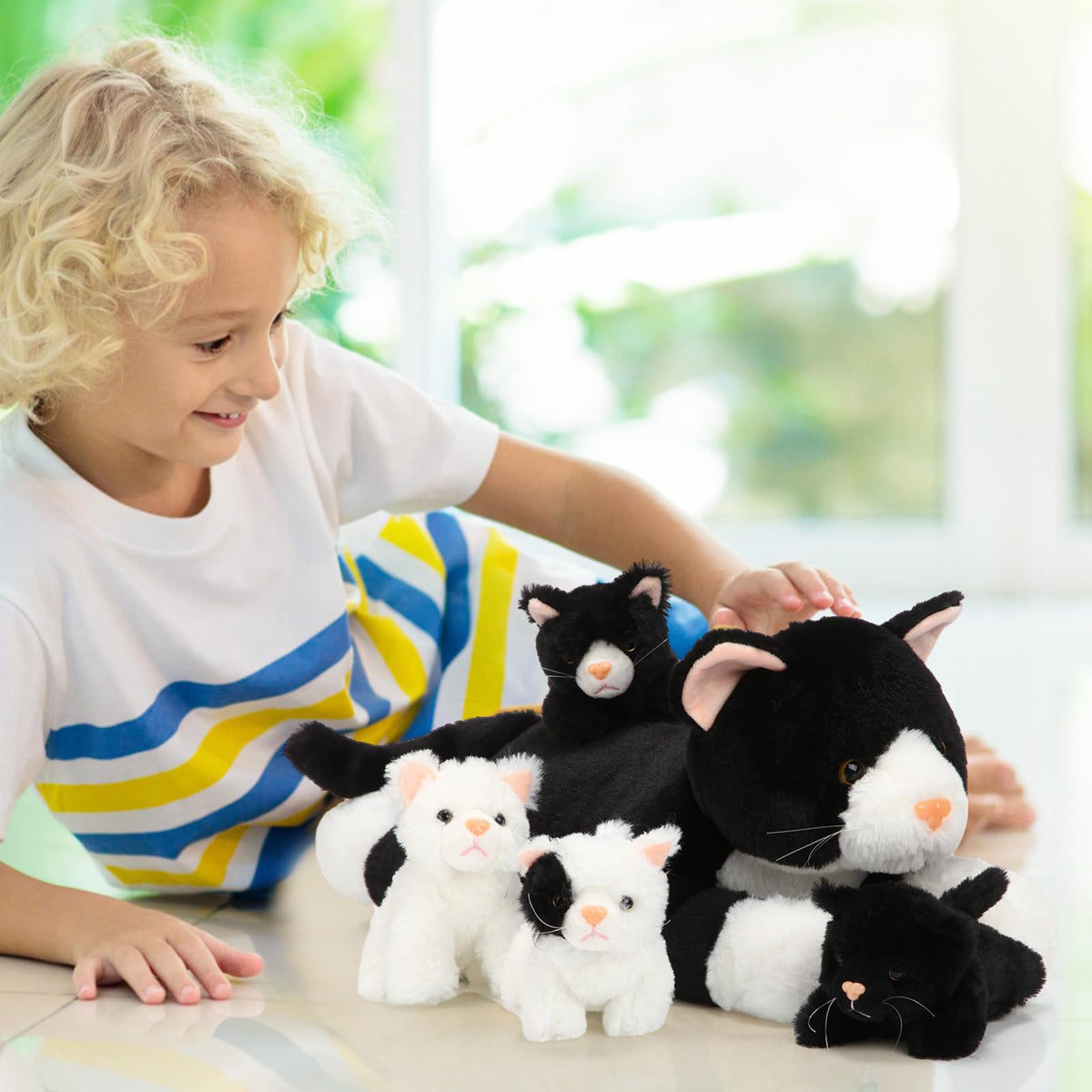 Skylety fluffy kittens in varied styles add shelf charm.