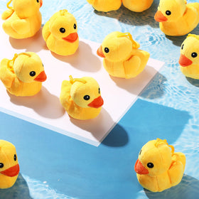 Skylety yellow duck plush back view, charming decor accent.