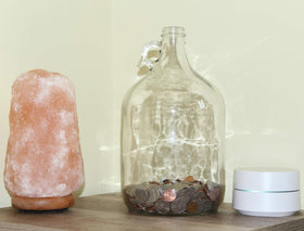 Skywin Swear Jar on a desk as stylish office décor and coin bank.