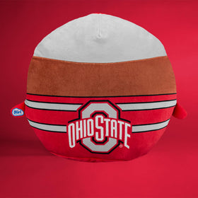 The Sleep Squad Brutus plush makes a cozy nightstand companion.