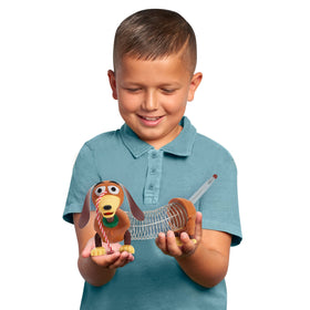 Slinky Dog Jr leash-action image showcases easy follow-along play beside your child.