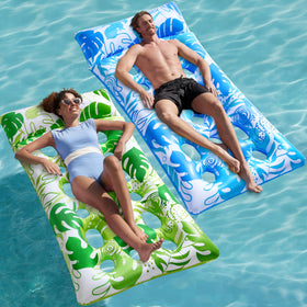 Sloosh 2-pack inflatable pool floats in blue and green with headrests for relaxed lounging.