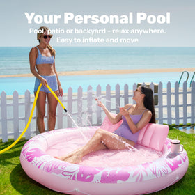 Sloosh floating platform centerpiece provides a steady pool bed for lounging.