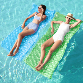 Sloosh inflatable pool float 64x32 in green-blue, ideal for relaxing in hot sun.