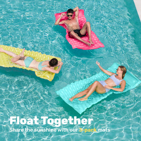 Sloosh pink inflatable pool mat for easy flotation and relaxation.
