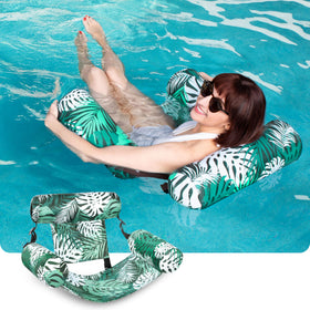 Sloosh inflatable pool lounge in green leaves pattern, perfect for sun-soaked beach days.