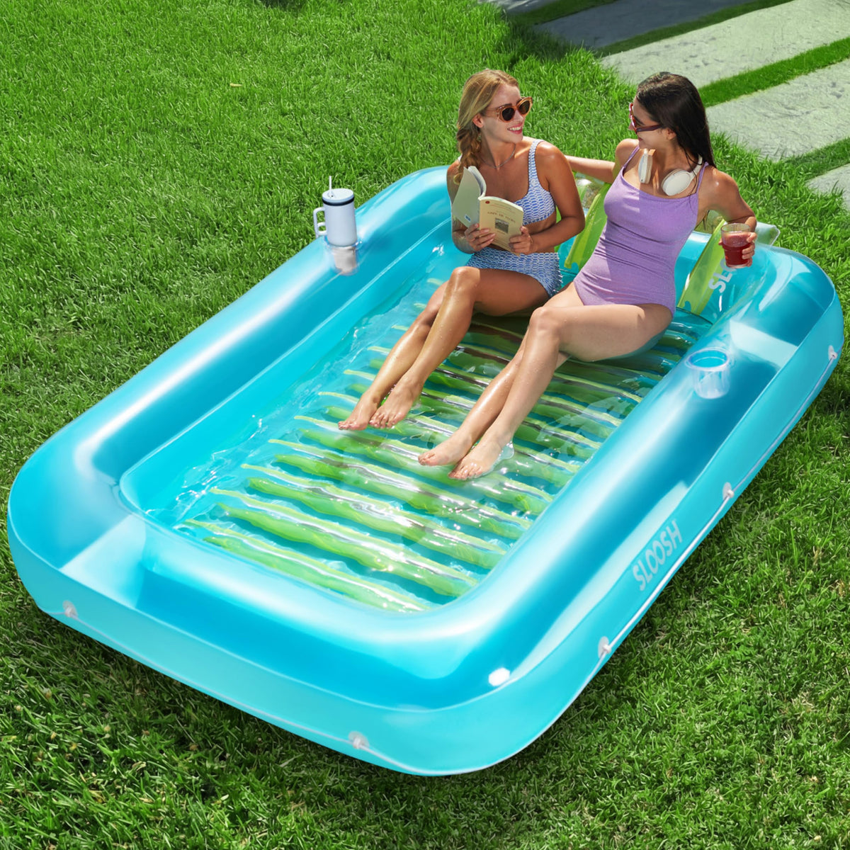 Sloosh inflatable tanning pool lounger with a large surface for shared sunbathing