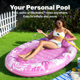Sloosh oval ergonomic tanning float offering stable lounging in water