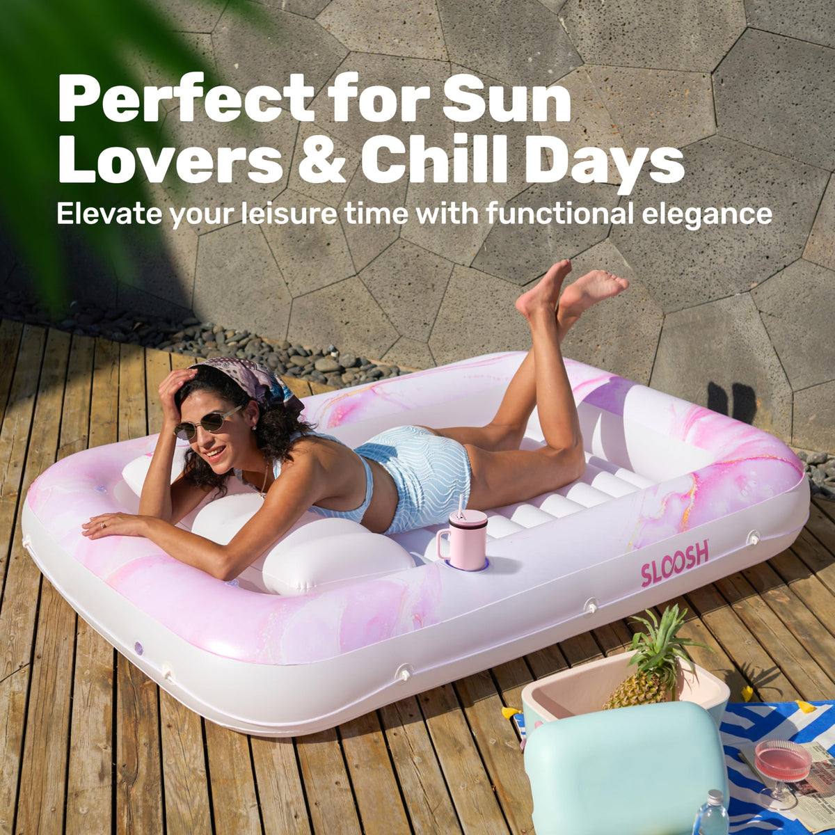Sloosh pink marble color pool float adds stylish touch to any water day.