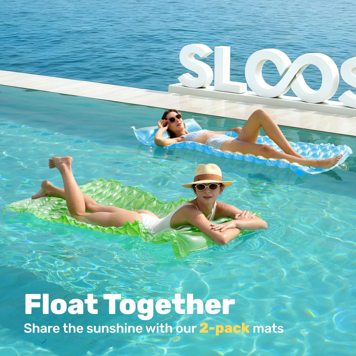 Sloosh two-pack pool mats with headrests, perfect for tandem lounging in the pool.