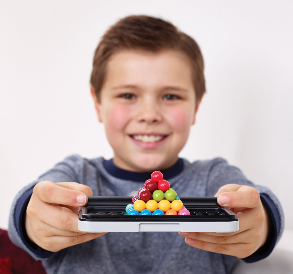 SmartGames age range 6 to adult scene — inclusive puzzle fun for families.