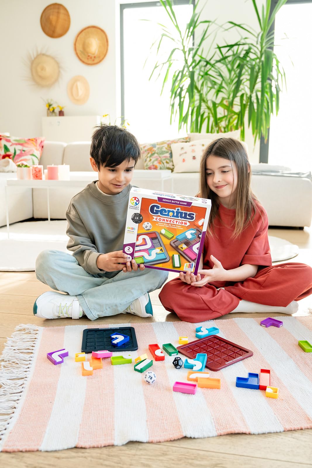SmartGames Genius Connection instruction pack detailing puzzles and configurations.