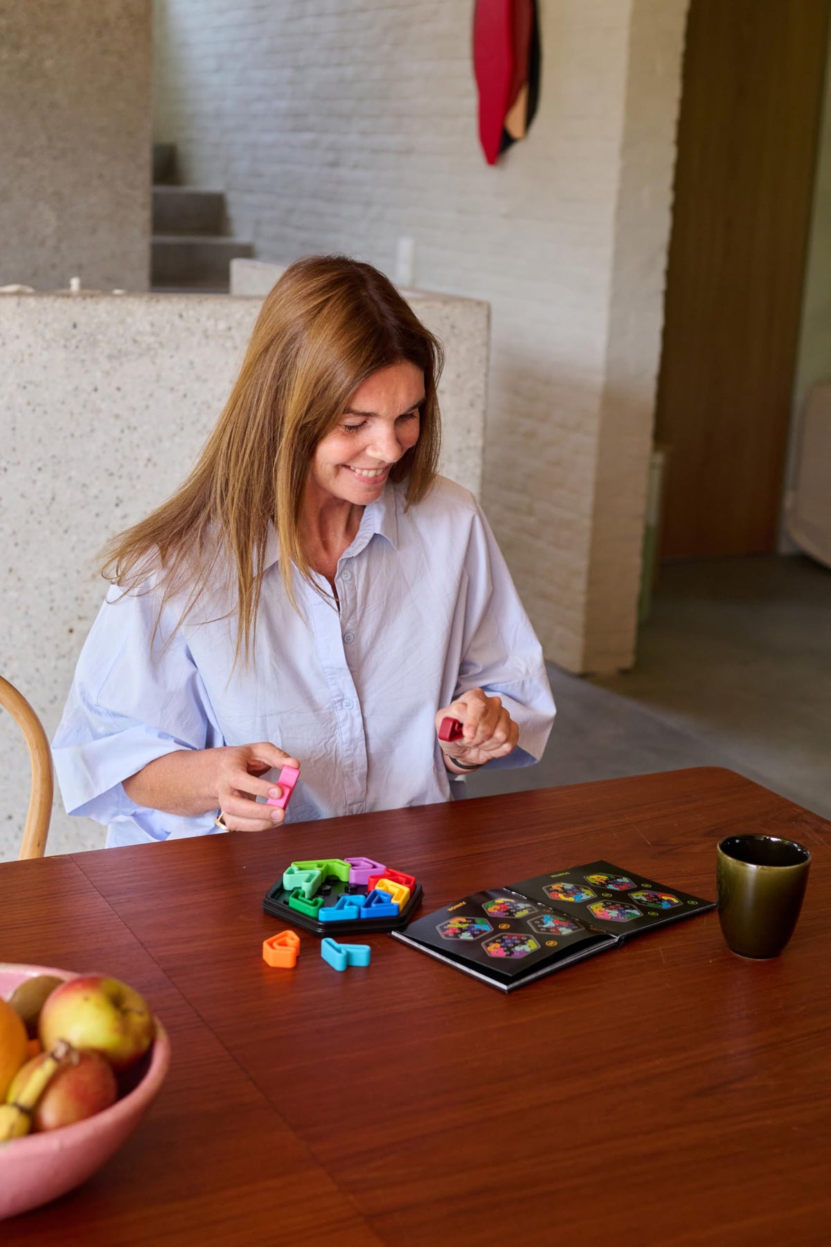 SmartGames IQ Deluxe with 120 challenges, from beginner to expert levels.
